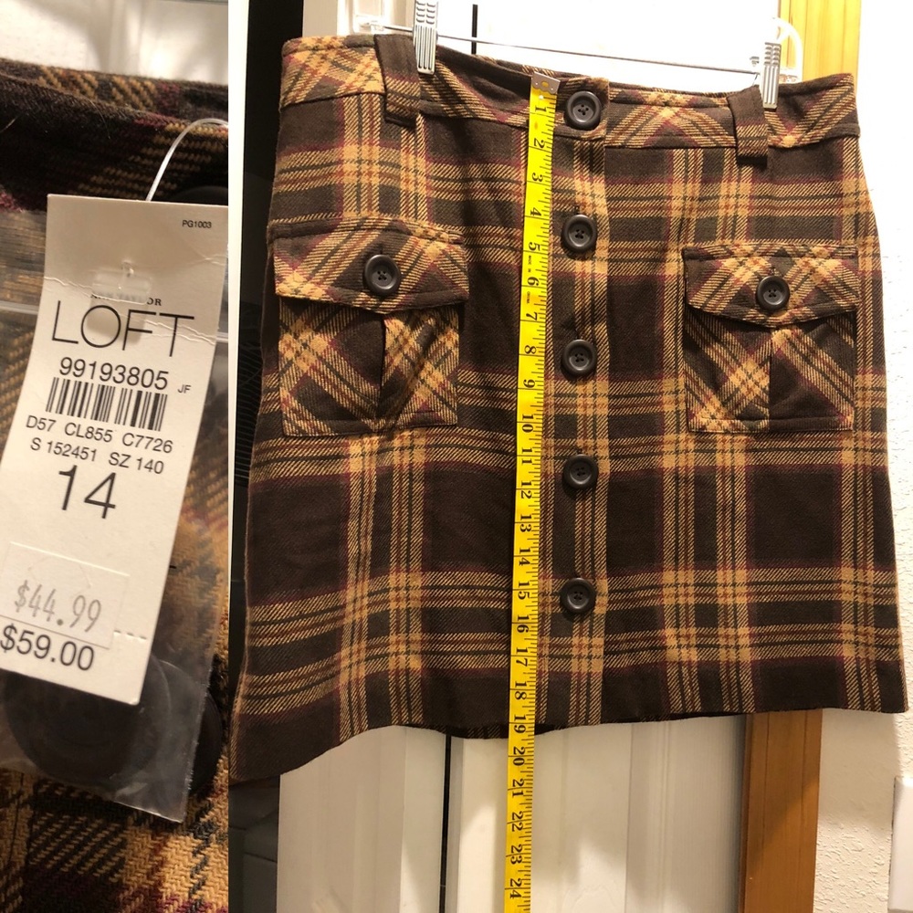 Brown wool blend button up skirt.